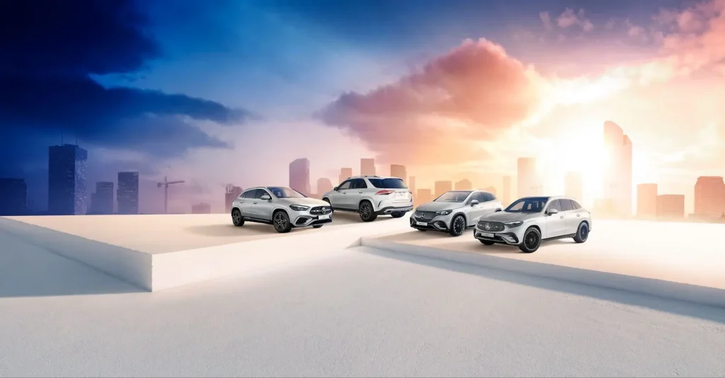 Four Mercedes-Benz cars on a white platform