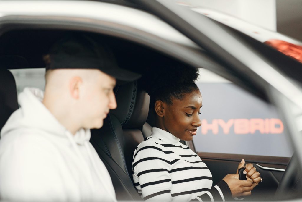 Are Novated Lease Savings Still Worth It - Woman with new car