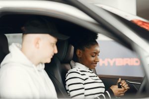 Are Novated Lease Savings Still Worth It - Woman with new car